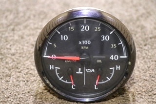 USED 3 IN 1 MEDALLION TACH / ENGINE / OIL DASH GAUGE