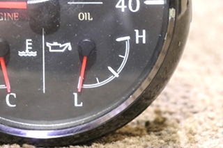 USED 3 IN 1 MEDALLION TACH / ENGINE / OIL DASH GAUGE