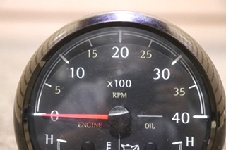 USED 3 IN 1 MEDALLION TACH / ENGINE / OIL DASH GAUGE