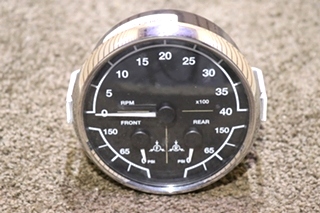 USED 3 IN 1 MEDALLION 8640-40014-19 TACH / FRONT / REAR DASH GAUGE