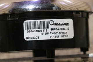 USED 3 IN 1 MEDALLION 8640-40014-19 TACH / FRONT / REAR DASH GAUGE