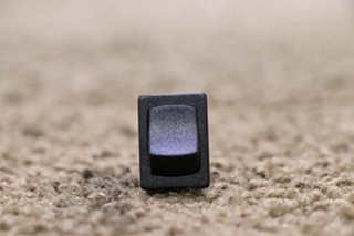 USED SMALL BLACK ROCKER SWITCH