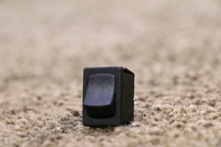USED SMALL BLACK ROCKER SWITCH