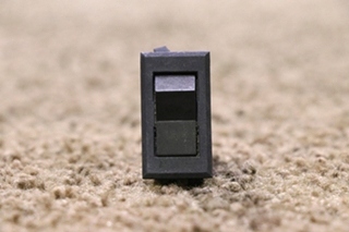 USED DASH RESET BLACK ROCKER SWITCH