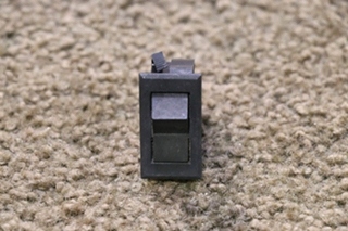 USED DASH RESET BLACK ROCKER SWITCH