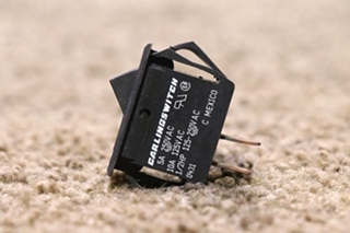 USED DASH RESET BLACK ROCKER SWITCH