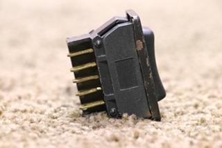 USED BLACK UP / DOWN ROCKER SWITCH 