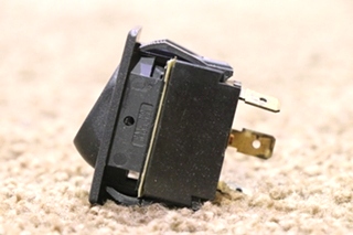 USED 0852-0270 BLACK WITH RED LIGHT ROCKER SWITCH