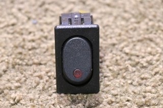 USED 0852-0270 BLACK WITH RED LIGHT ROCKER SWITCH