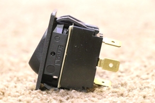 USED 0852-0270 BLACK WITH RED LIGHT ROCKER SWITCH