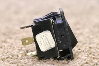 USED BLACK ROCKER SWITCH