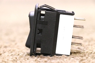 USED LIGHT ROCKER SWITCH