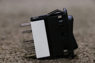 USED LIGHT ROCKER SWITCH