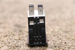 USED LIGHT ROCKER SWITCH