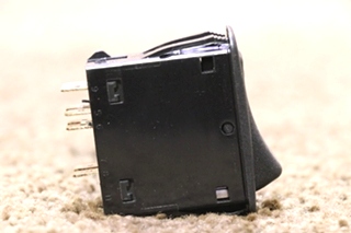 USED BLACK LIGHTED L24D1 ROCKER SWITCH