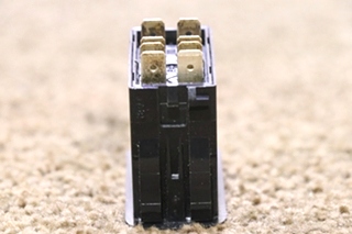 USED BLACK LIGHTED L24D1 ROCKER SWITCH