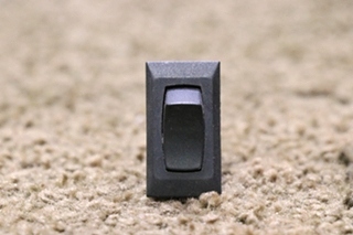 USED BLACK ROCKER SWITCH