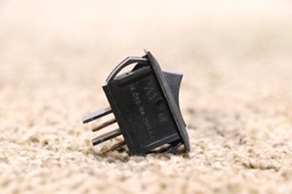 USED BLACK ROCKER SWITCH