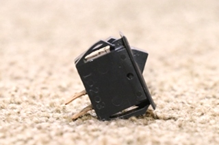 USED BLACK RESET ROCKER SWITCH