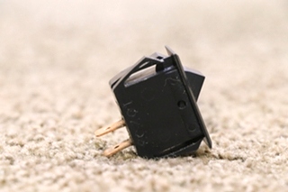 USED BLACK ROCKER SWITCH
