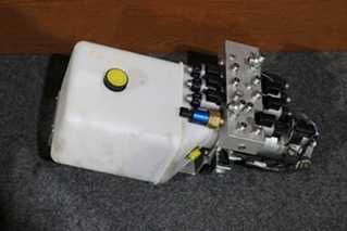 USED 414850 LIPPERT COMPONENTS HYDRAULIC PUMP