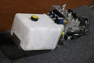 USED 414850 LIPPERT COMPONENTS HYDRAULIC PUMP