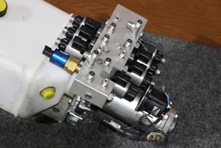 USED 414850 LIPPERT COMPONENTS HYDRAULIC PUMP