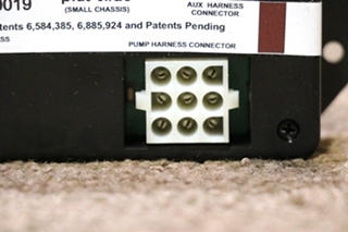USED LIPPERT 365150/20019 4-POINT LEVELER (4 WAY VALVE) PLUS SLIDE MODULE