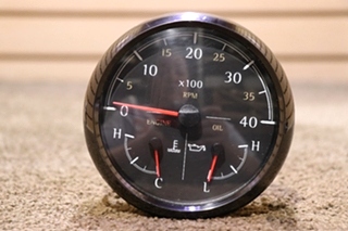 USED MEDALLION 3 IN 1 TACH / ENGINE / OIL DASH GAUGE 16622899