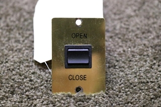 USED OPEN / CLOSE ROCKER SWITCH GOLD/BRASS PANEL RV/MOTORHOME PARTS FOR SALE