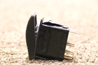 USED BLACK ROCKER SWITCH WITH GREEN LIGHT BAR VBD2 MOTORHOME PARTS FOR SALE