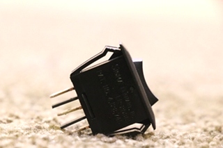 USED SMALL BLACK ROCKER SWITCH MOTORHOME PARTS FOR SALE