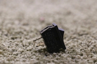 USED SMALL BLACK ROCKER SWITCH MOTORHOME PARTS FOR SALE