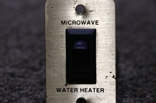 USED BRASS MICROWAVE / WATER HEATER SWITCH PANEL RV PARTS FOR SALE