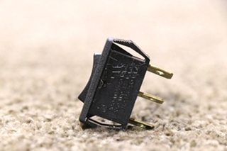 USED SMALL BLACK ROCKER SWITCH RV/MOTORHOME PARTS FOR SALE