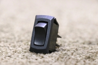 USED RV BLACK ROCKER SWITCH FOR SALE