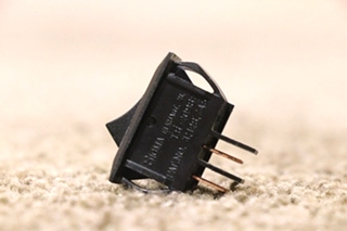 USED SMALL BLACK ROCKER SWITCH MOTORHOME PARTS FOR SALE